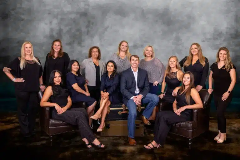Professional dental team portrait at Winchester, VA practice location.