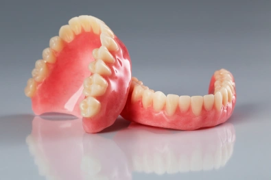 Complete dentures for replacing missing teeth