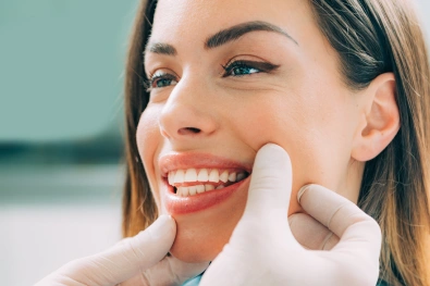 Dentist providing preventive dental care to a patient