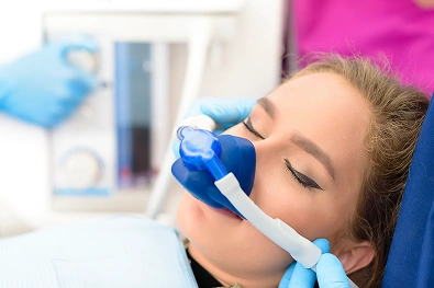 Patient receiving comfortable sedation dentistry treatment