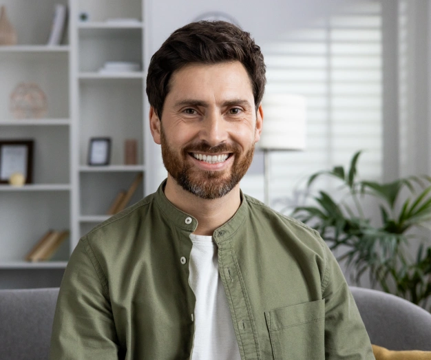 Smiling man with a healthy, confident smile